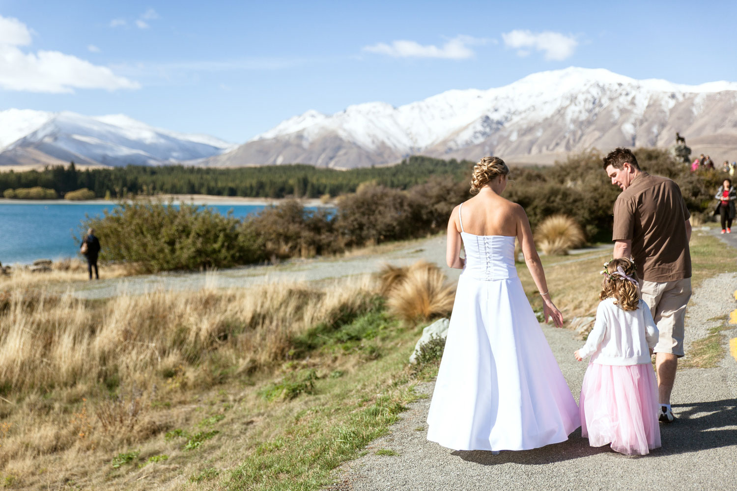 lake tekapo wedding couple and daughter