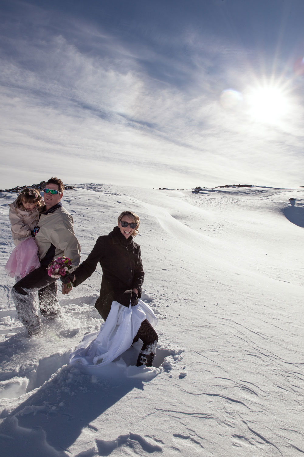 destination wedding couple on snow mountain