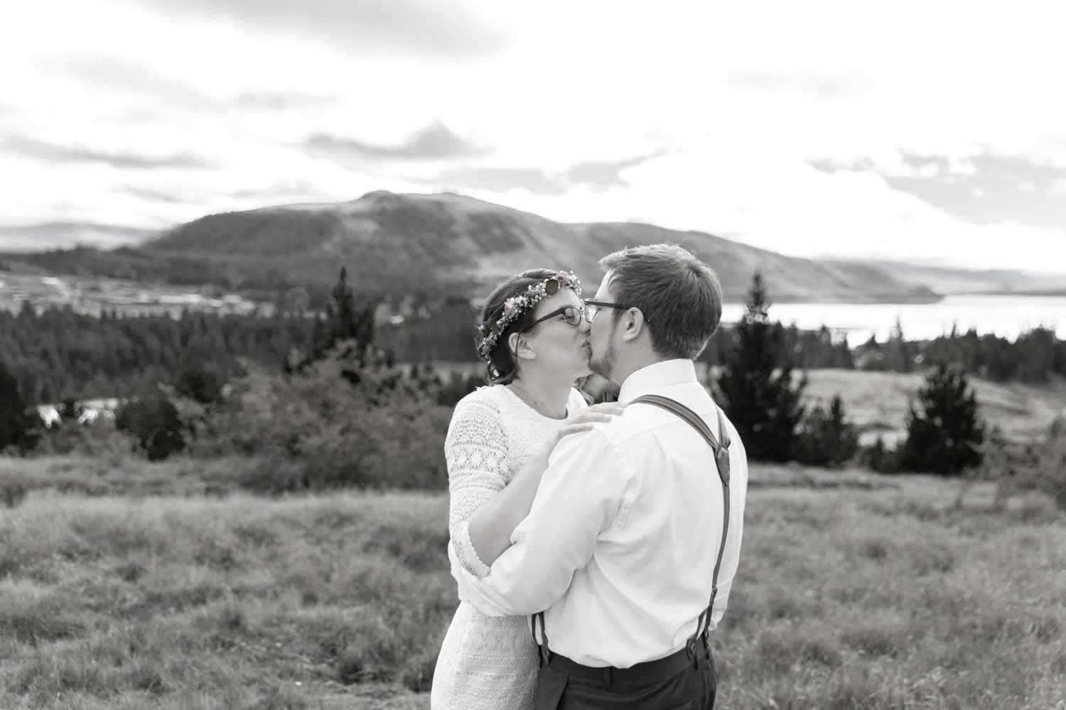 destination wedding bride kissing in black and white