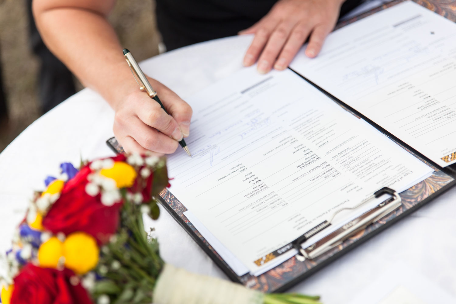 lake tekapo wedding signing papers