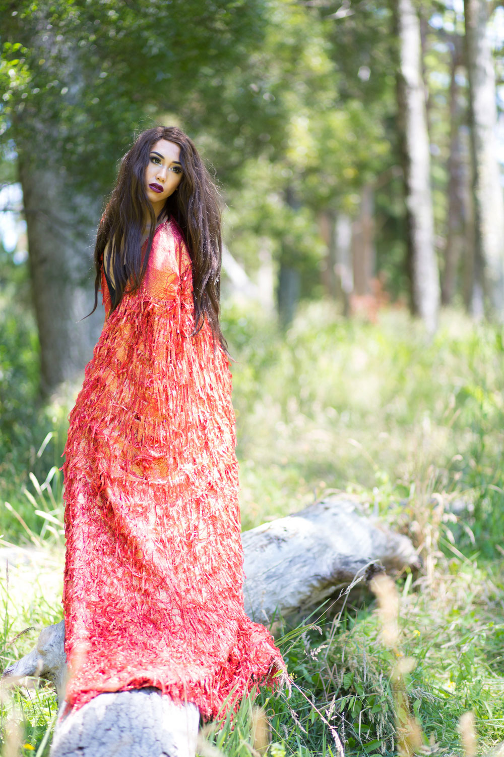 auckland forest model shoot standing on log