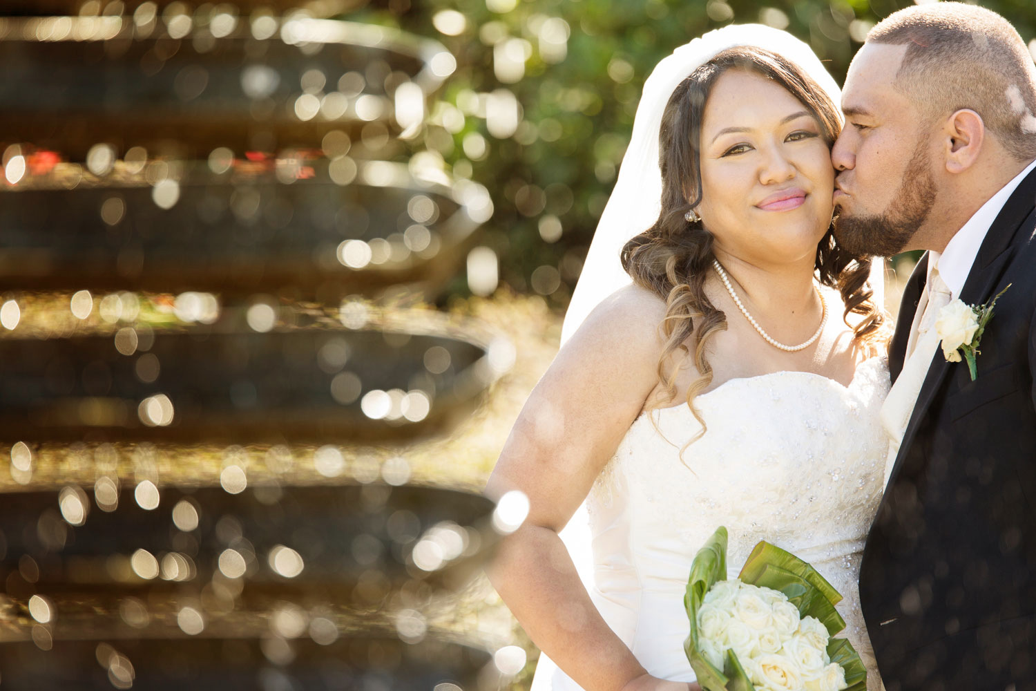 auckland botanic gardens wedding couple portrait by the fountain