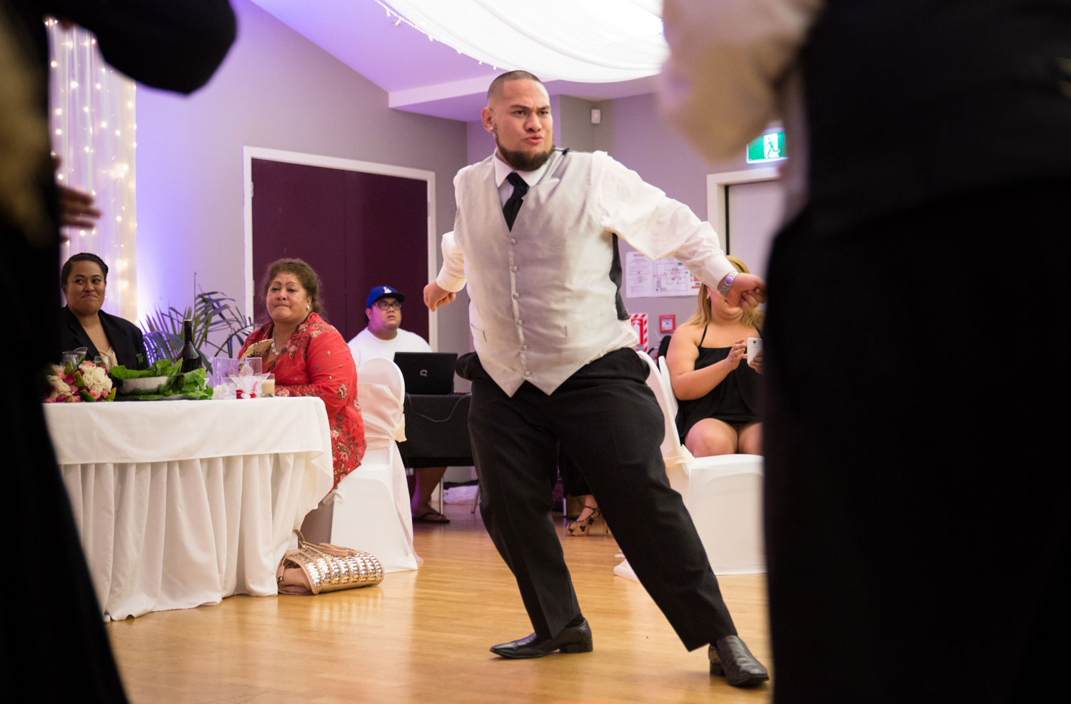 auckland wedding reception groomsman dancing