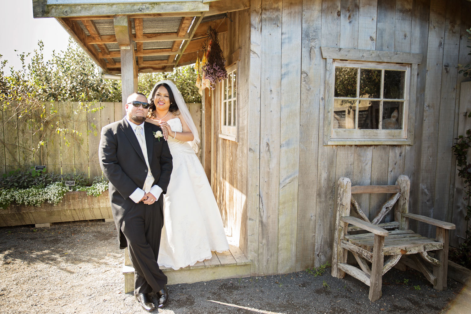 auckland botanic gardens wedding couple putting sunglasses on