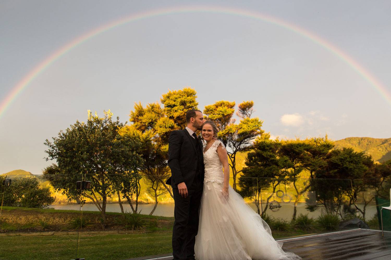 bay of islands wedding rainbow photo
