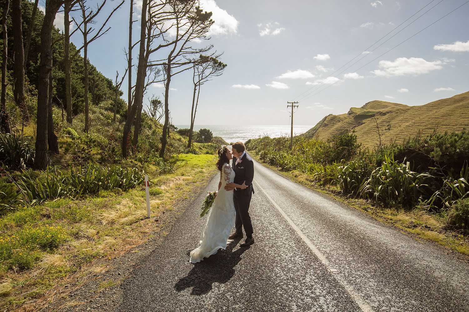 auckland castaways resort wedding couple photo on the road
