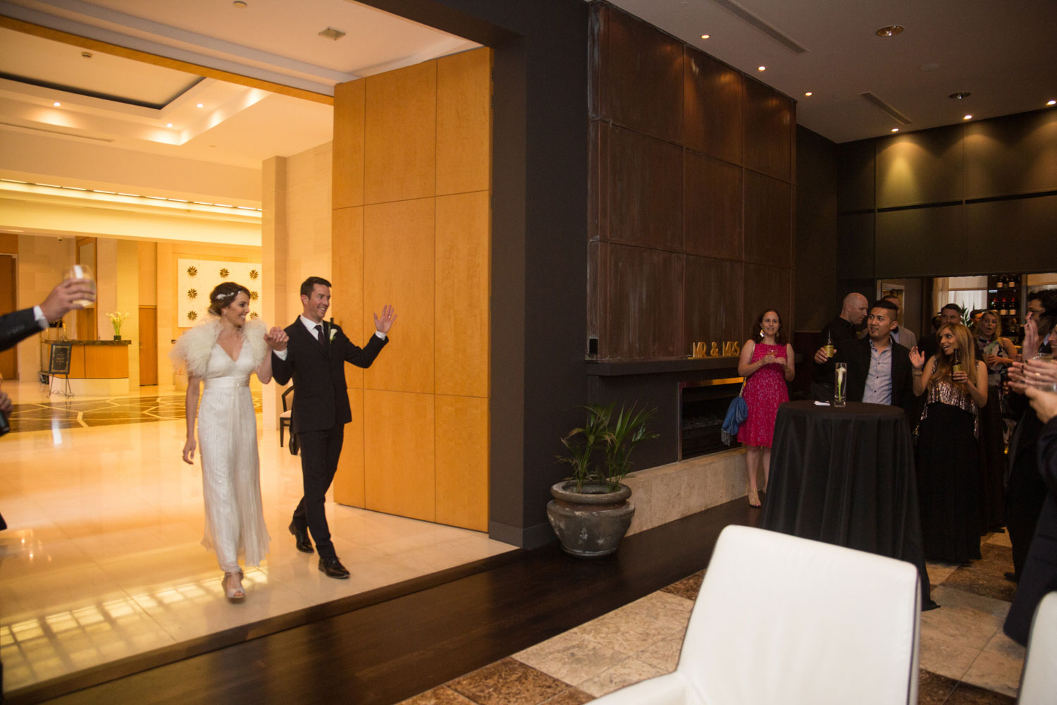 bride and groom announced into reception