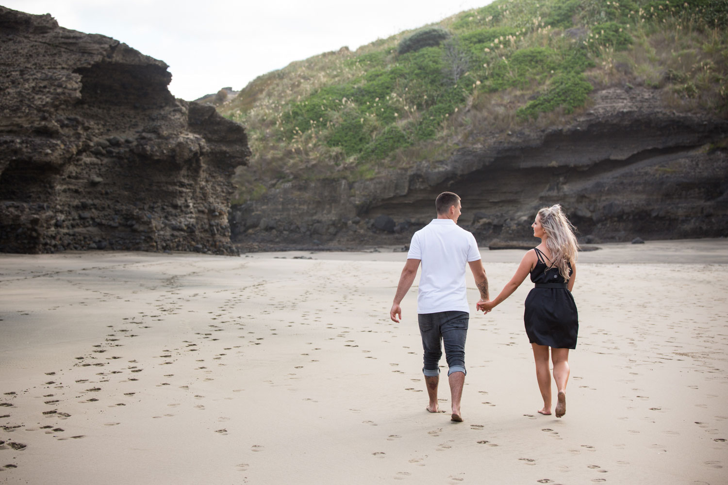 couple walking away from camera