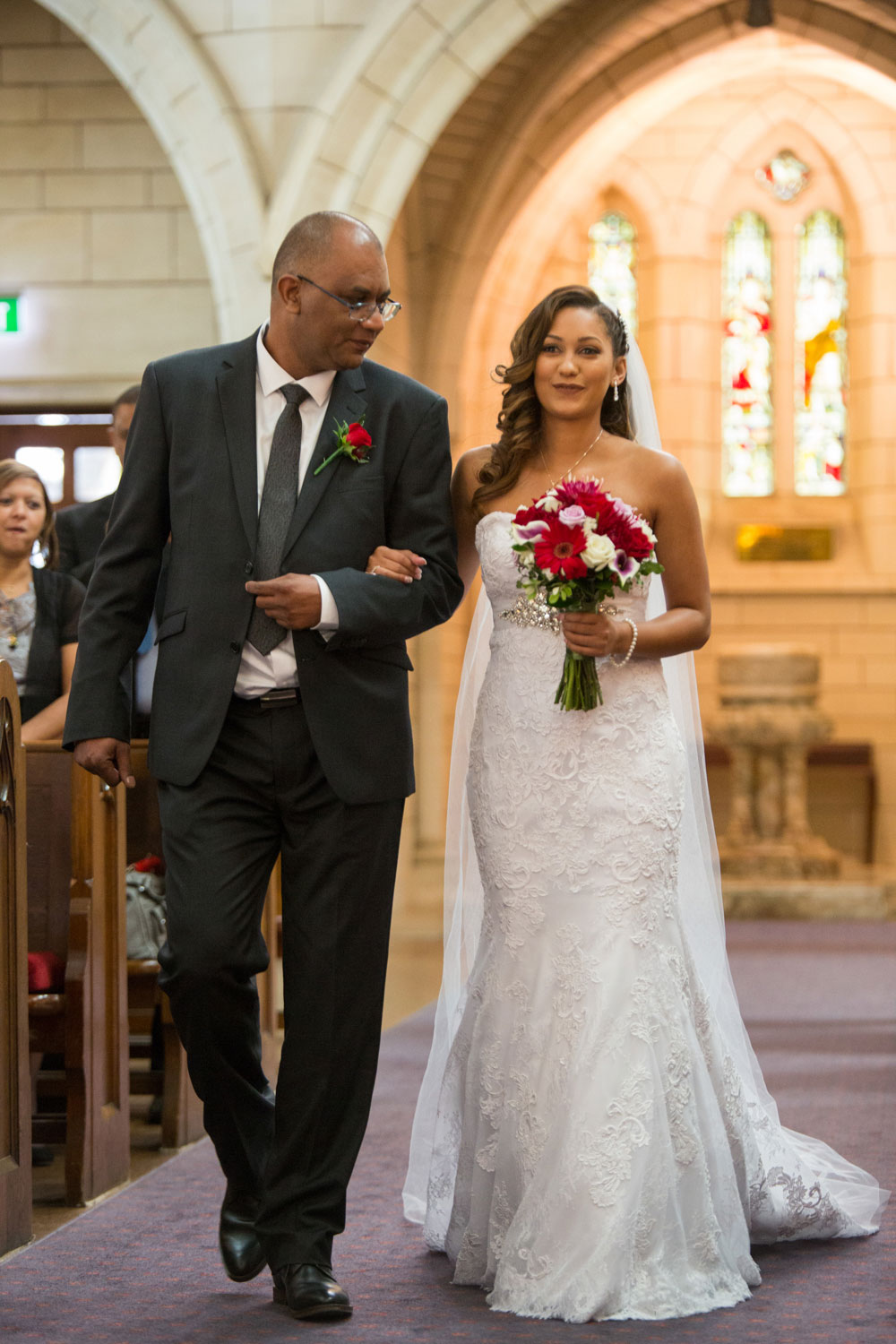 auckland wedding bride walking down the aisle