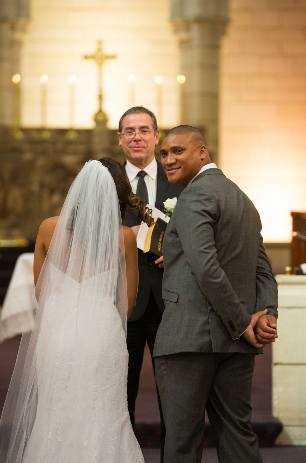 auckland wedding groom turning back