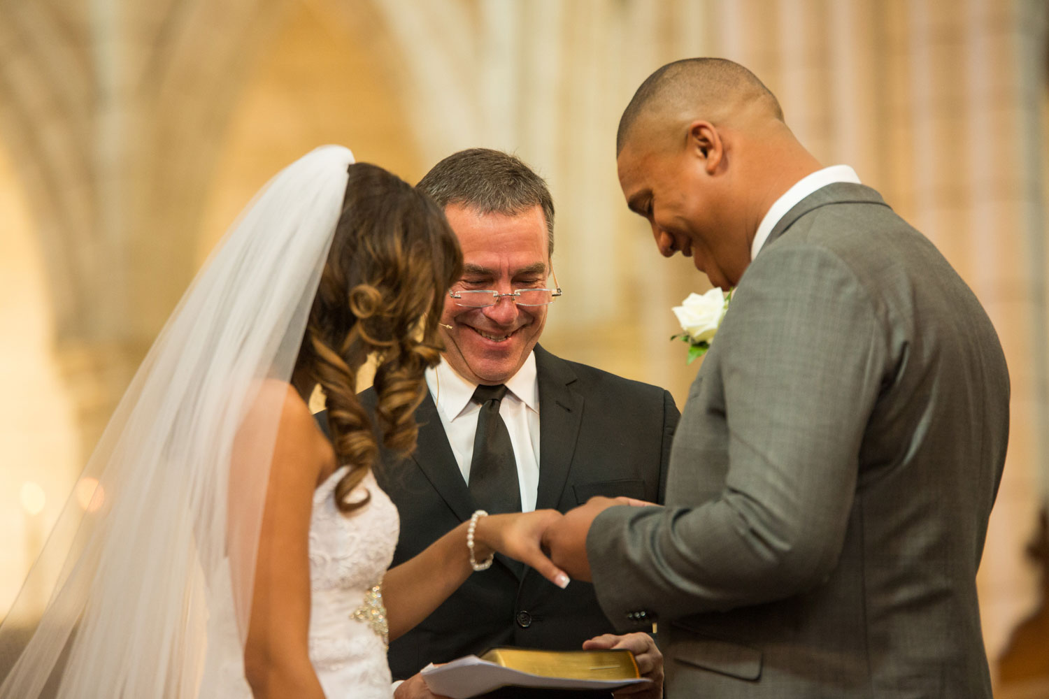 auckland wedding couple exchanging rings