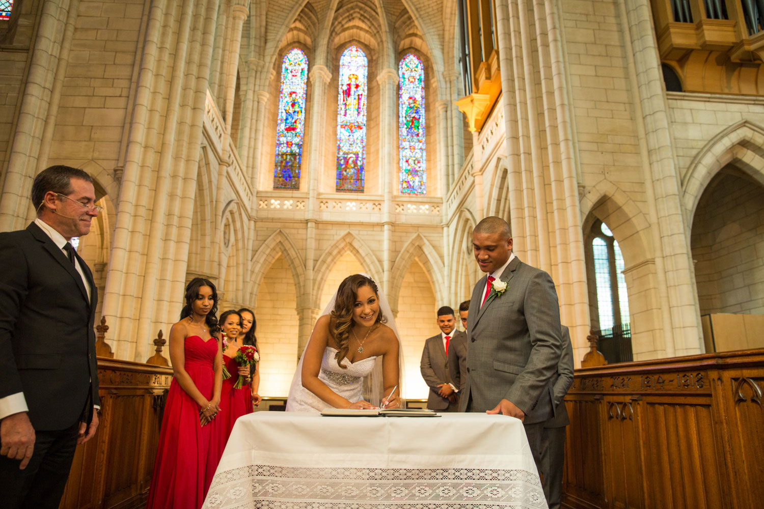 auckland wedding bride signing the papers