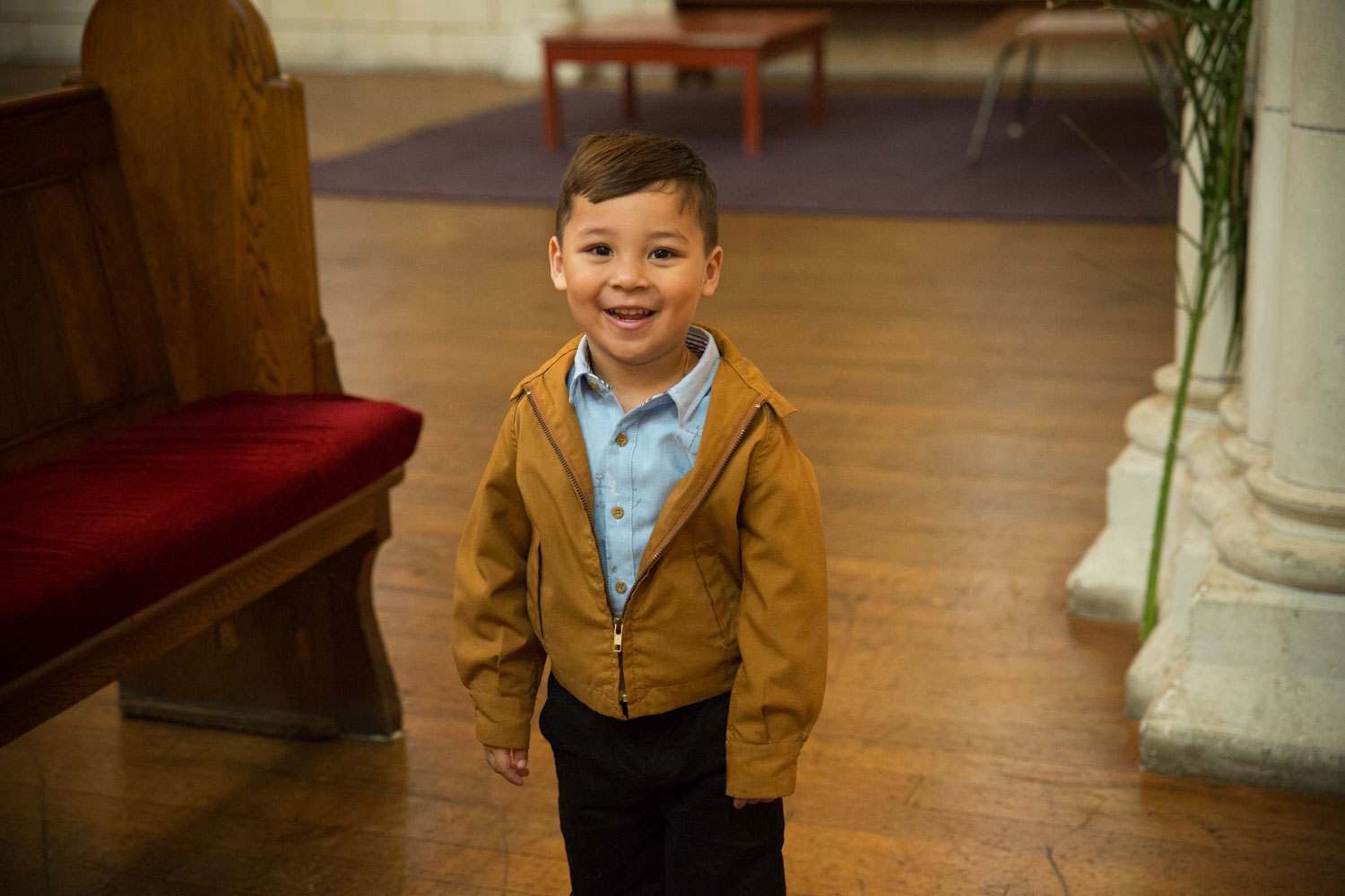 auckland wedding boy smiling at the camera