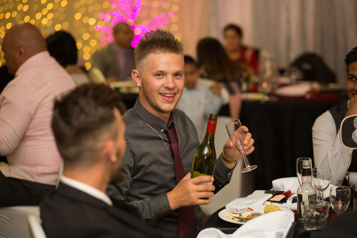 auckland wedding guest smiling