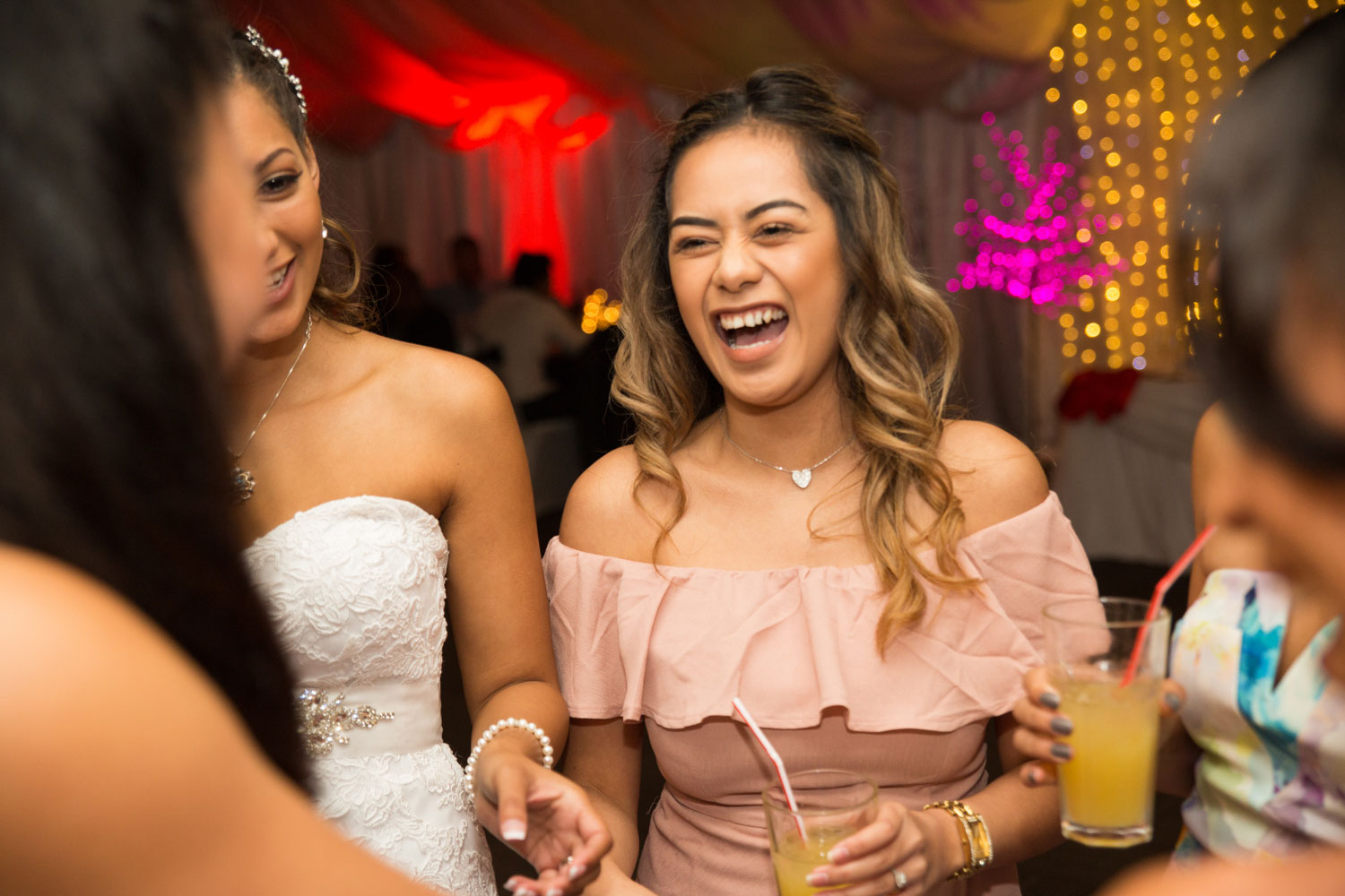 auckland wedding reception female guest laughing and talking