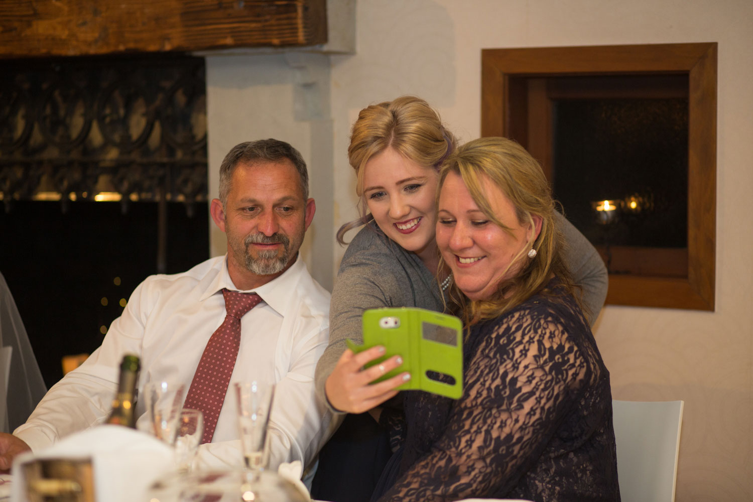 guests taking a selfie wedding reception