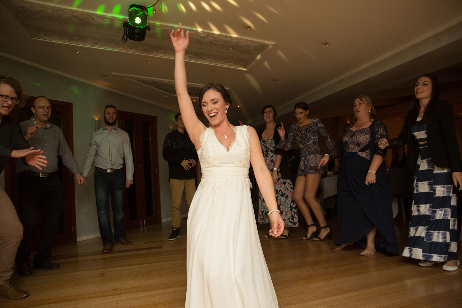 bride dancing at cassels wedding venue