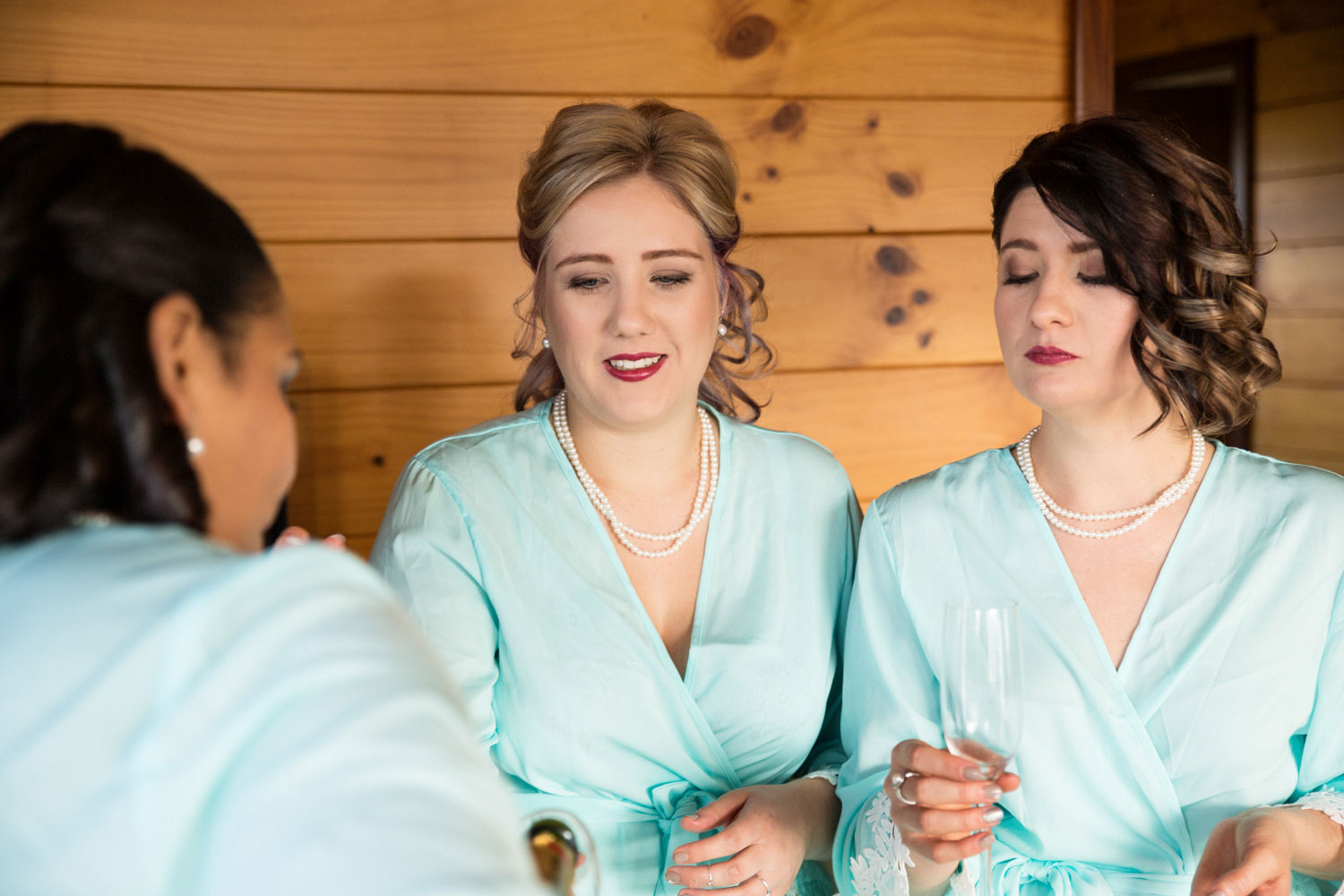 bridesmaids drinking wine