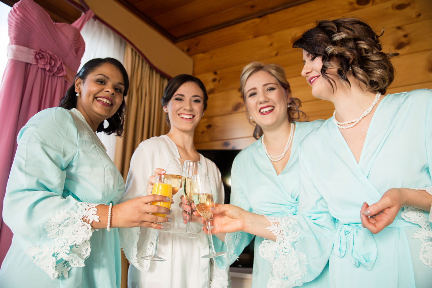 bridesmaids saying cheers