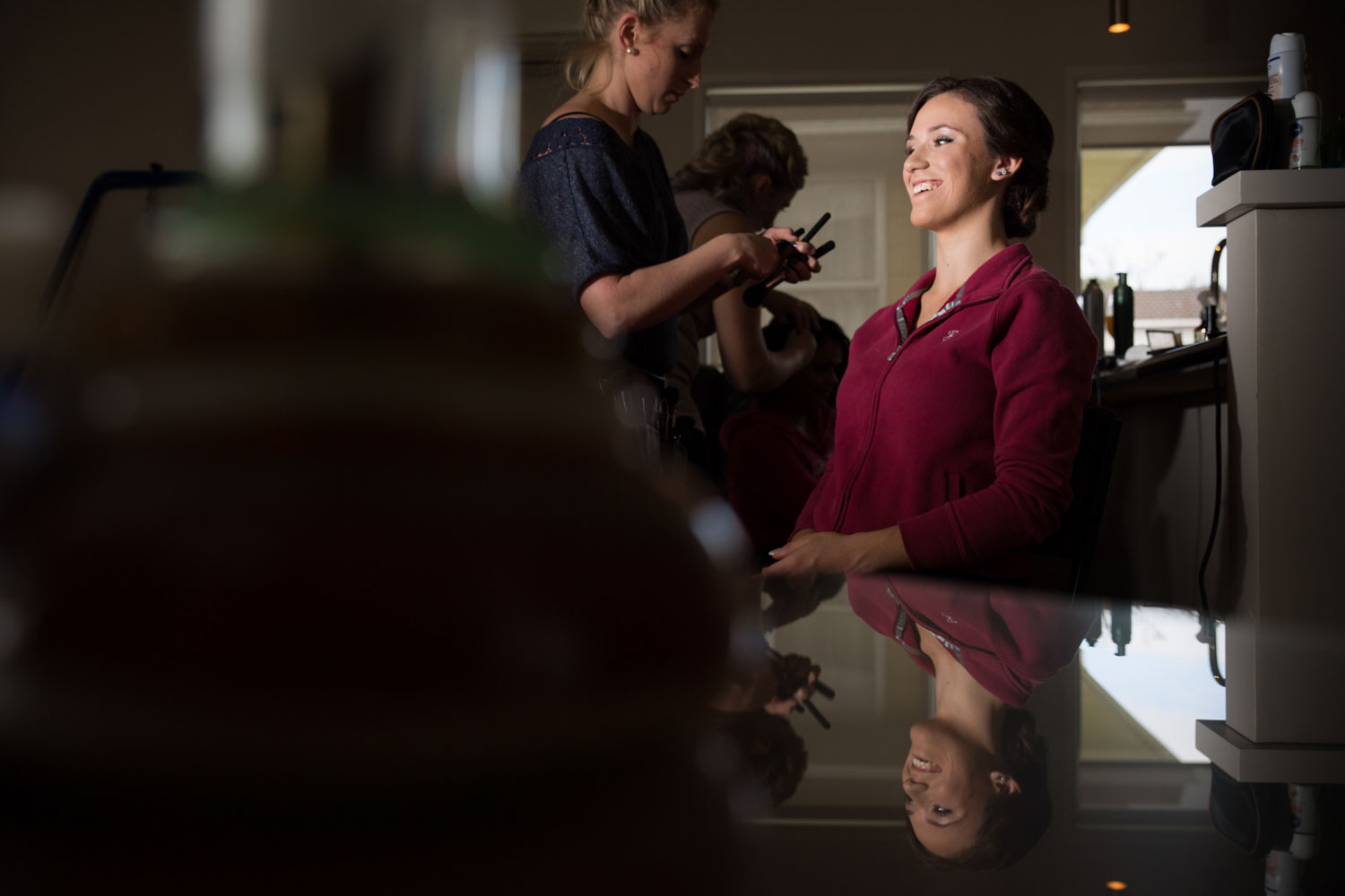 auckland wedding bride doing make up