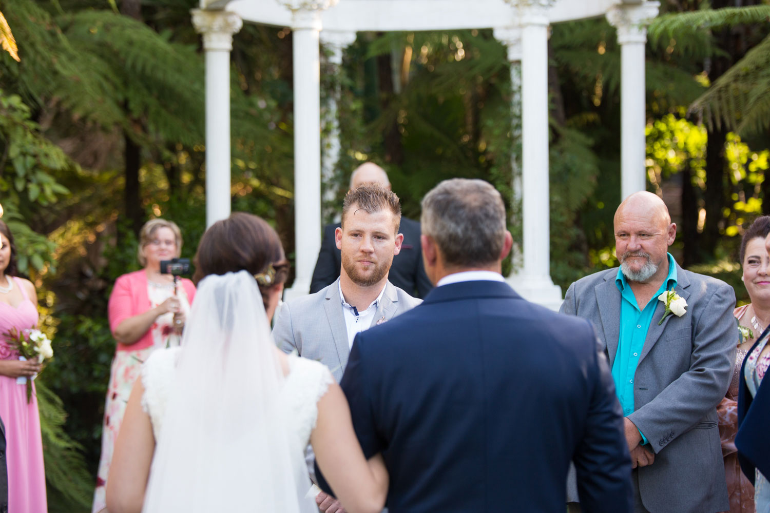 groom looking at bride