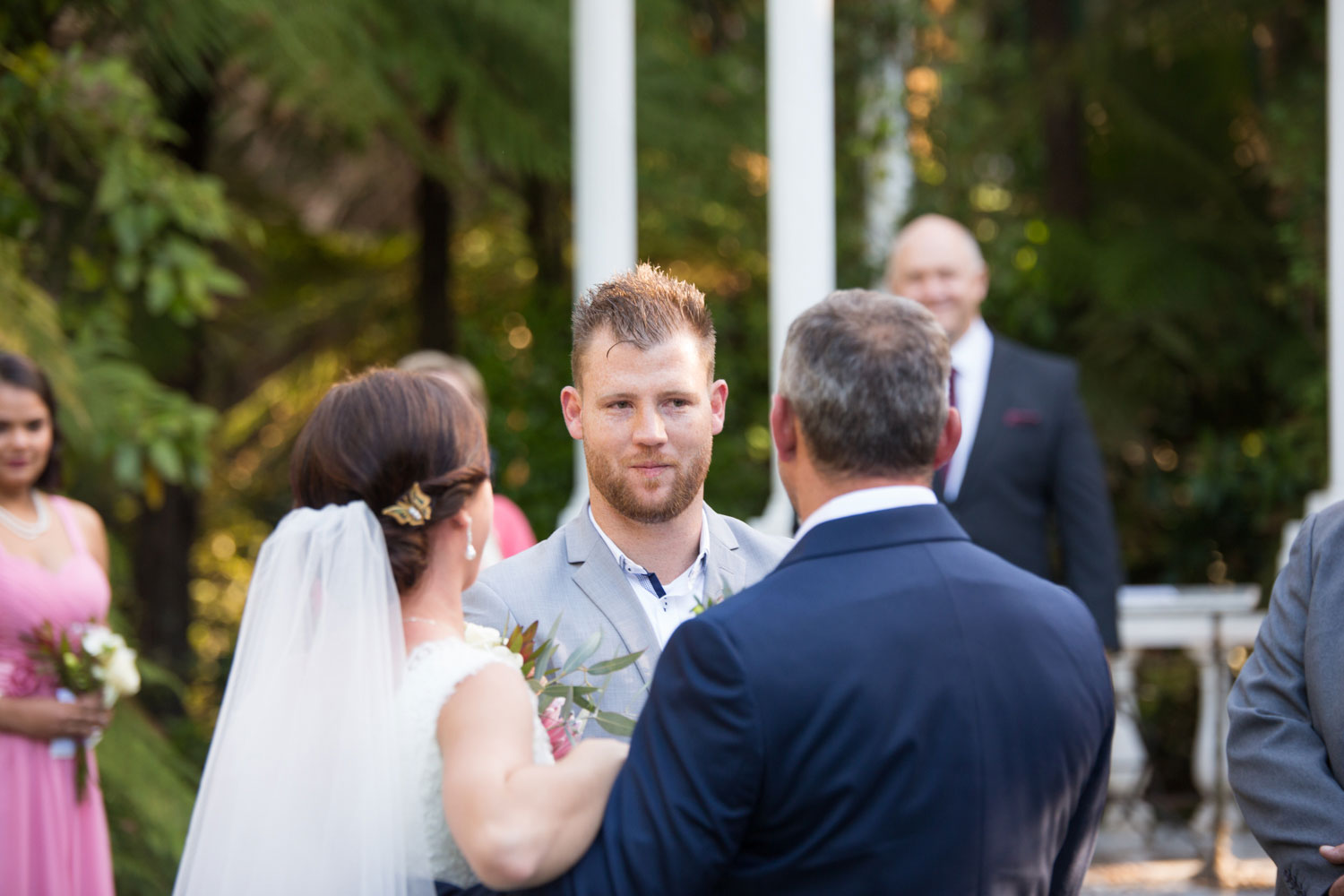 groom's reaction to bride and father
