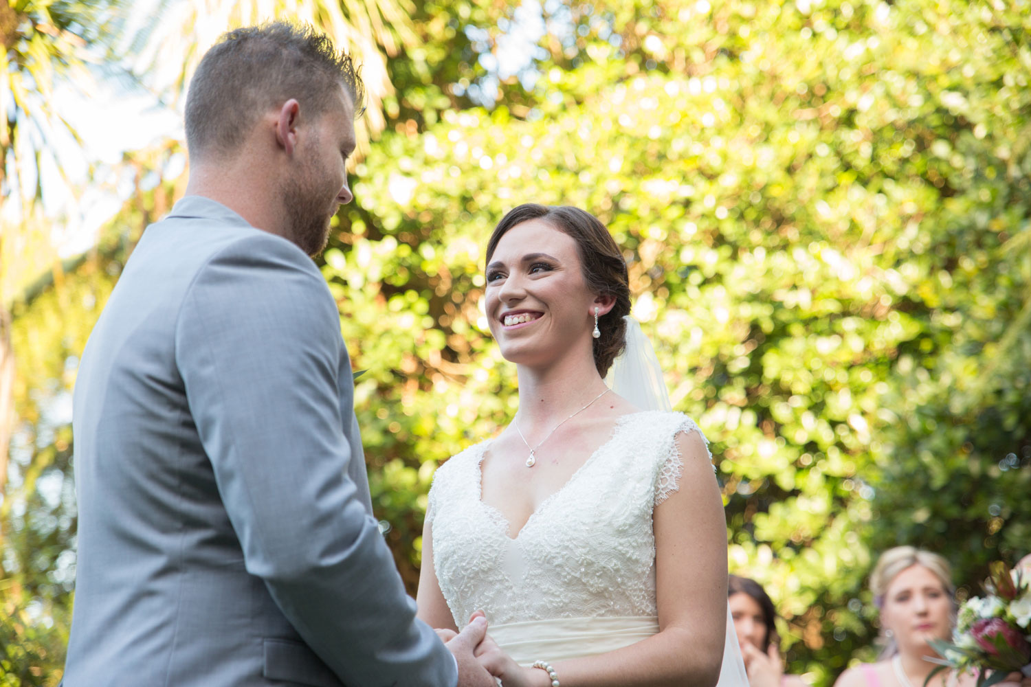 bride looking at groom during ceremony