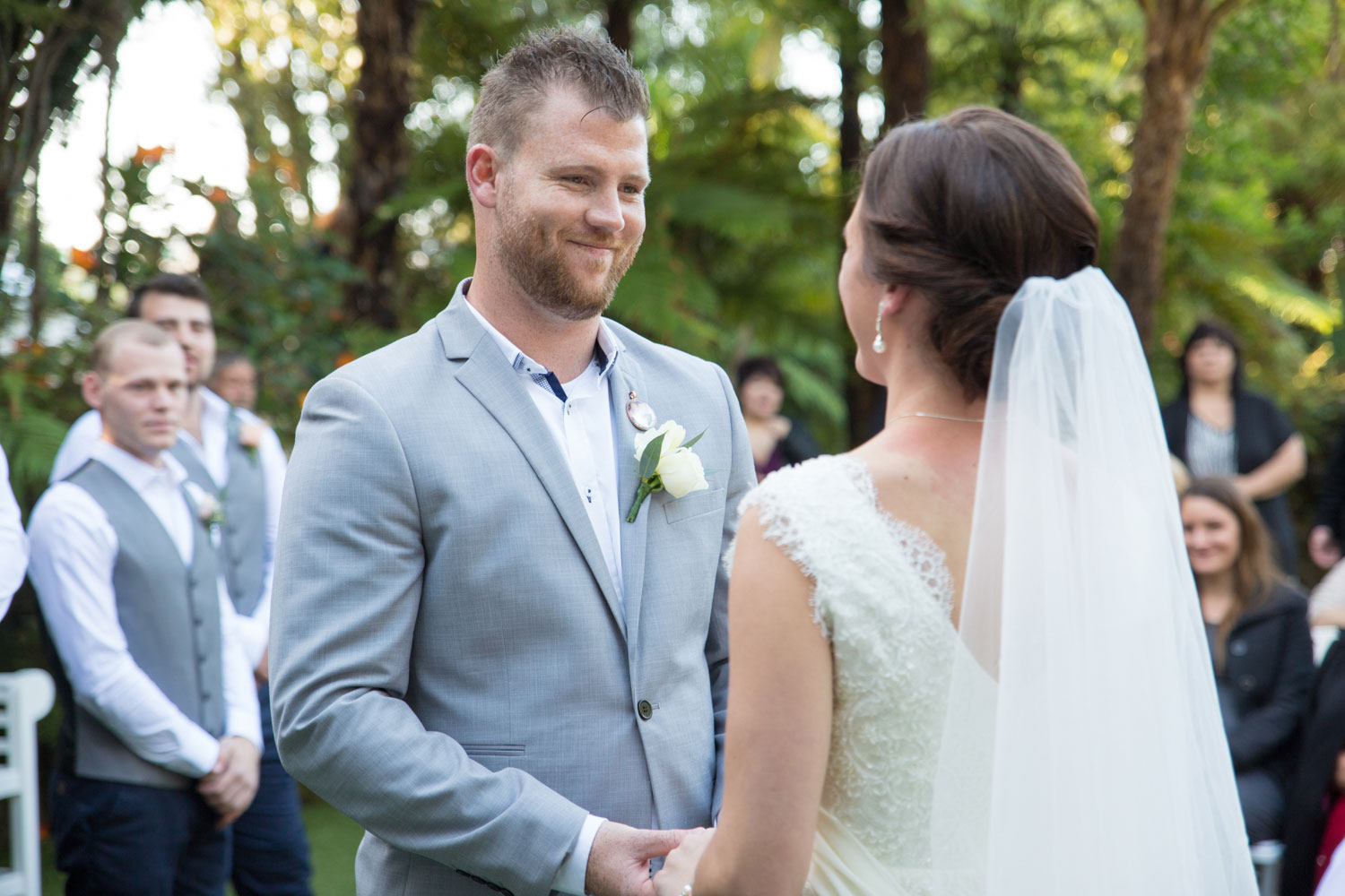 groom smiling at bride cassels wedding venue