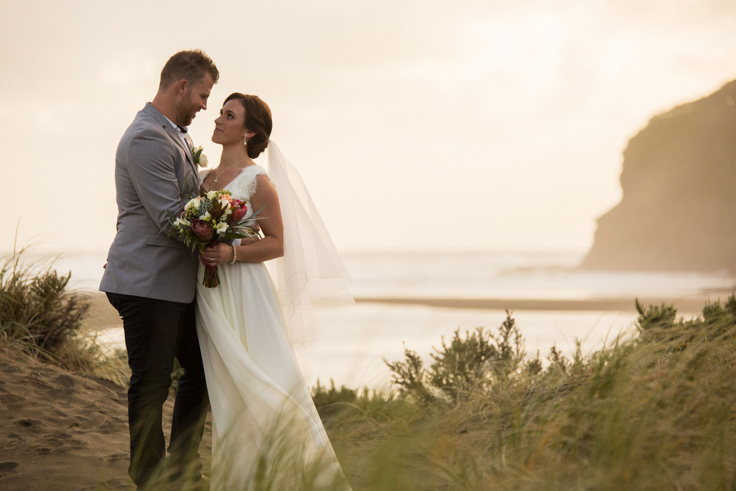 couple portrait at bethells beach