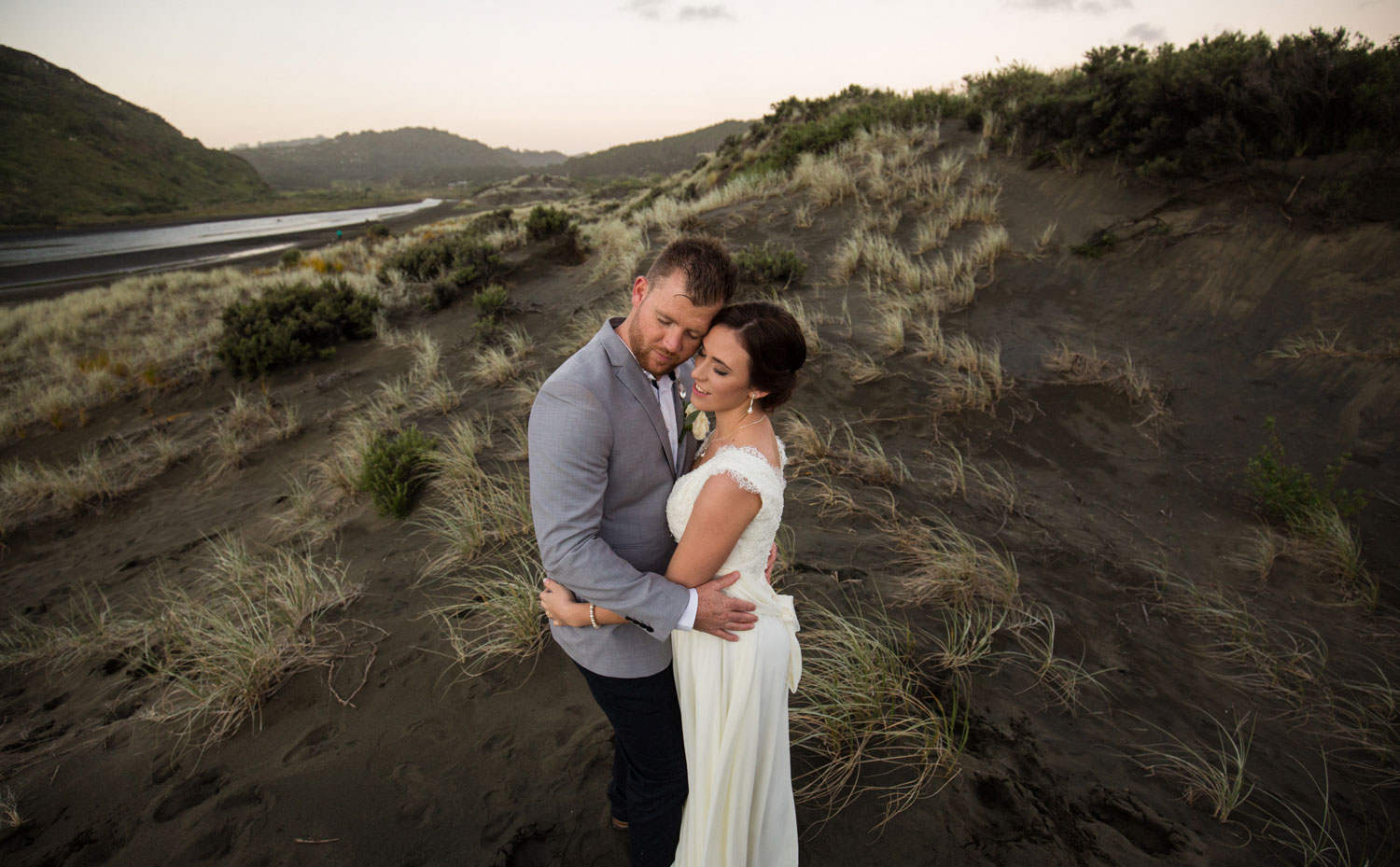 couple embrace on beach