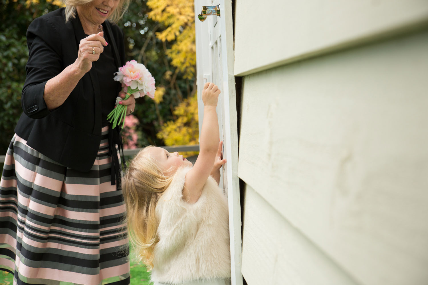 girl opening door at gracehill