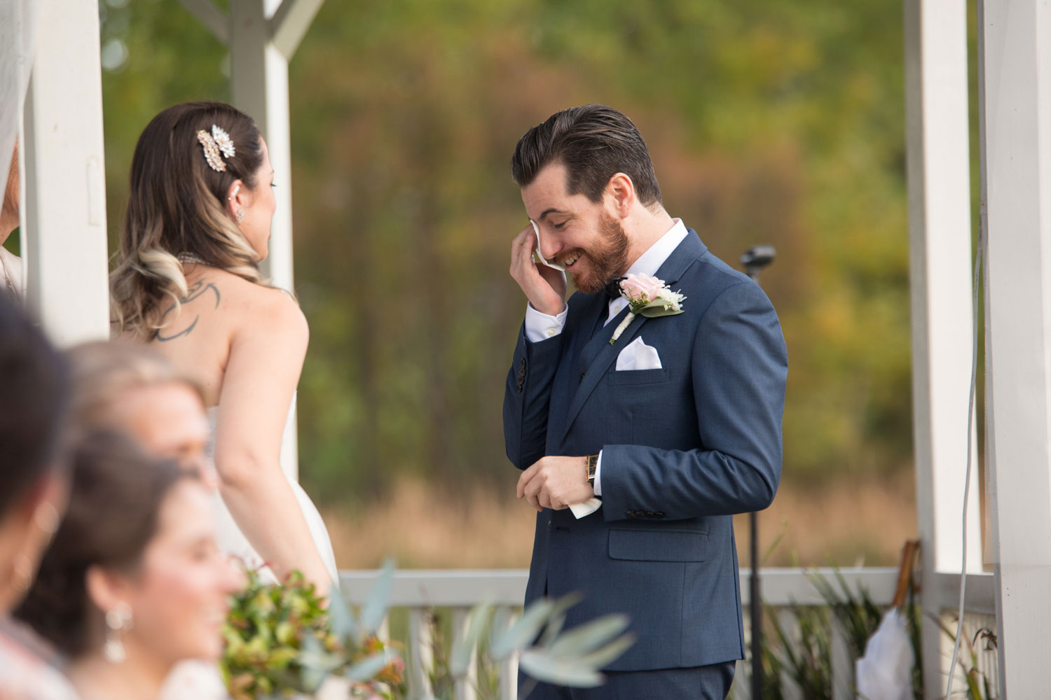 groom tears up during auckland wedding ceremony