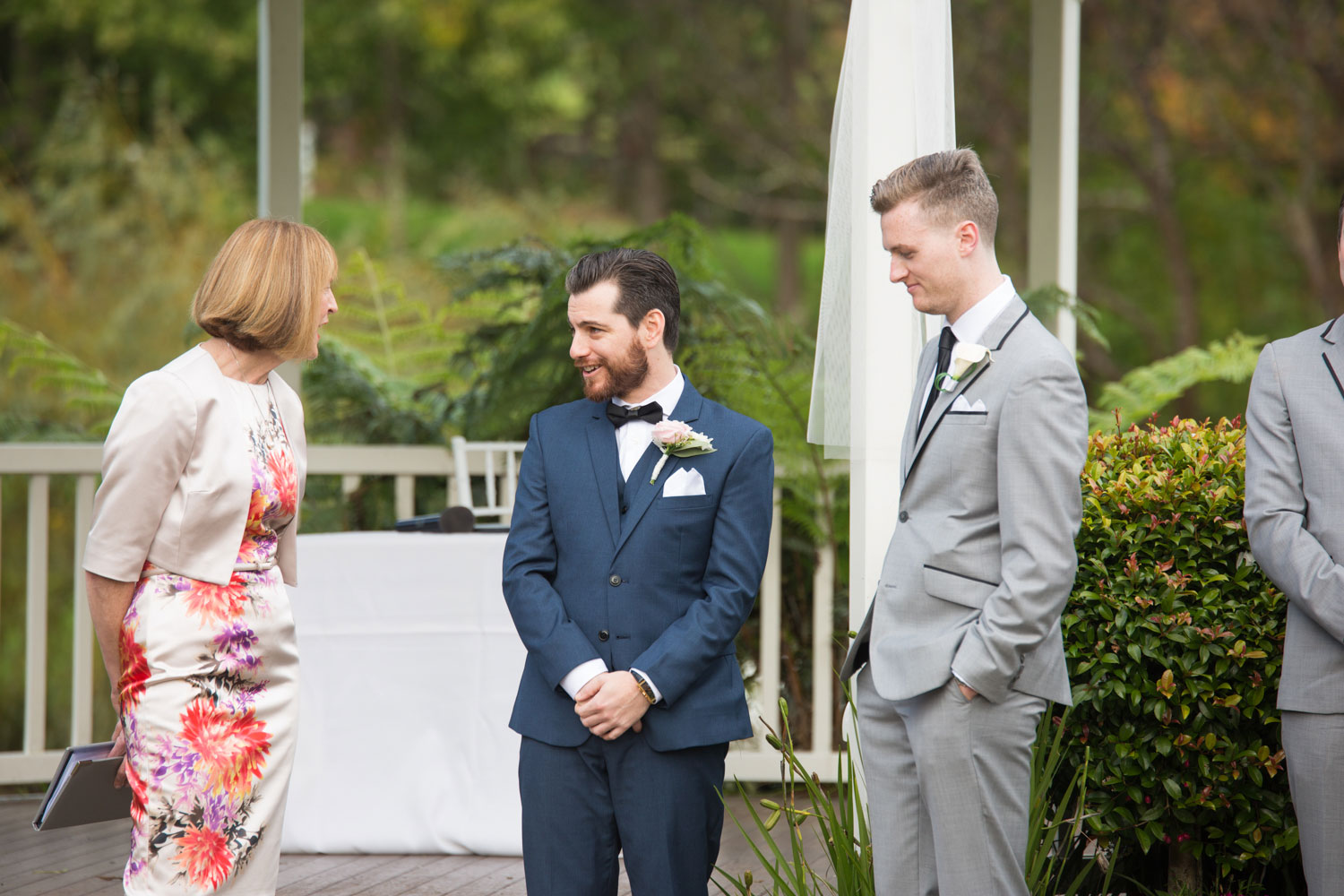 groom and celebrant talking