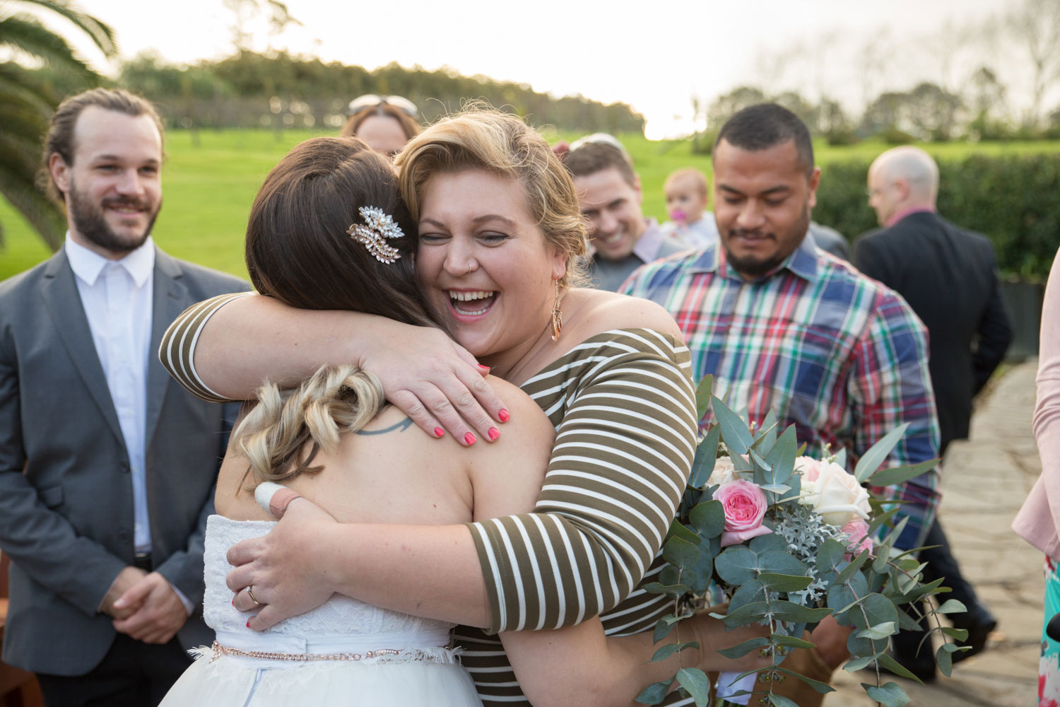 bride hugging guest at gracehill