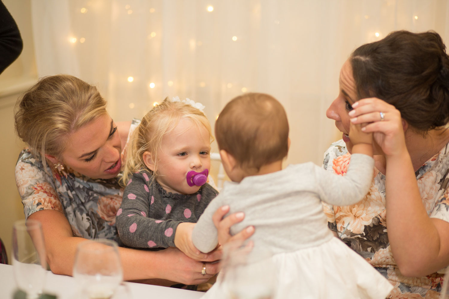 babies looking at each other during gracehill auckland wedding