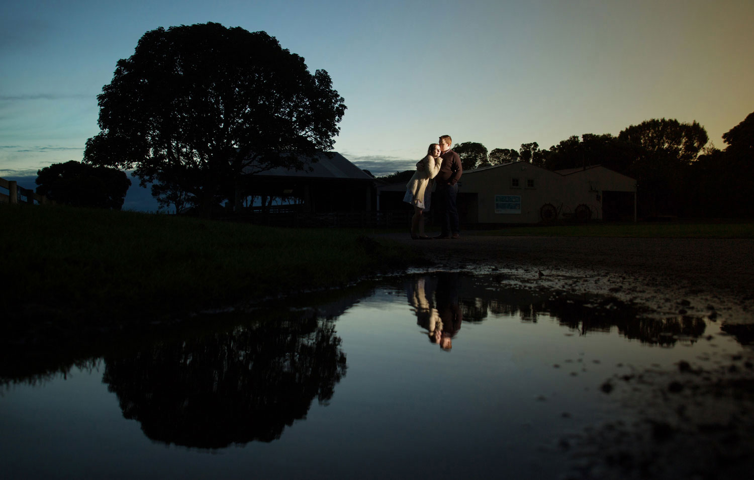 auckland engagement shoot couple reflection on water