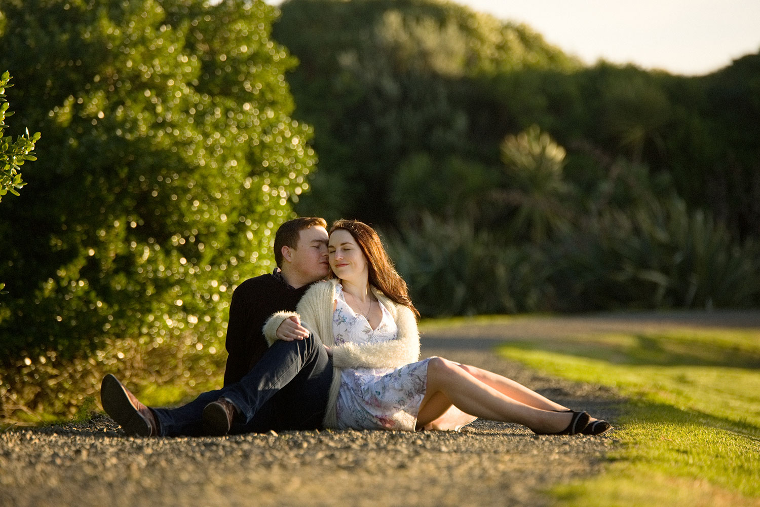 auckland engagement session couple embracing