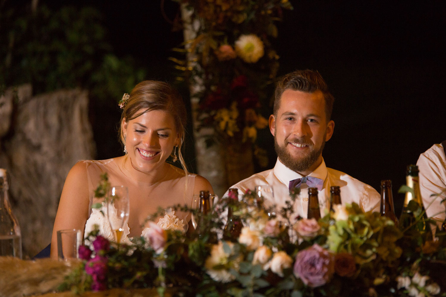 auckland wedding couple sitting at the table