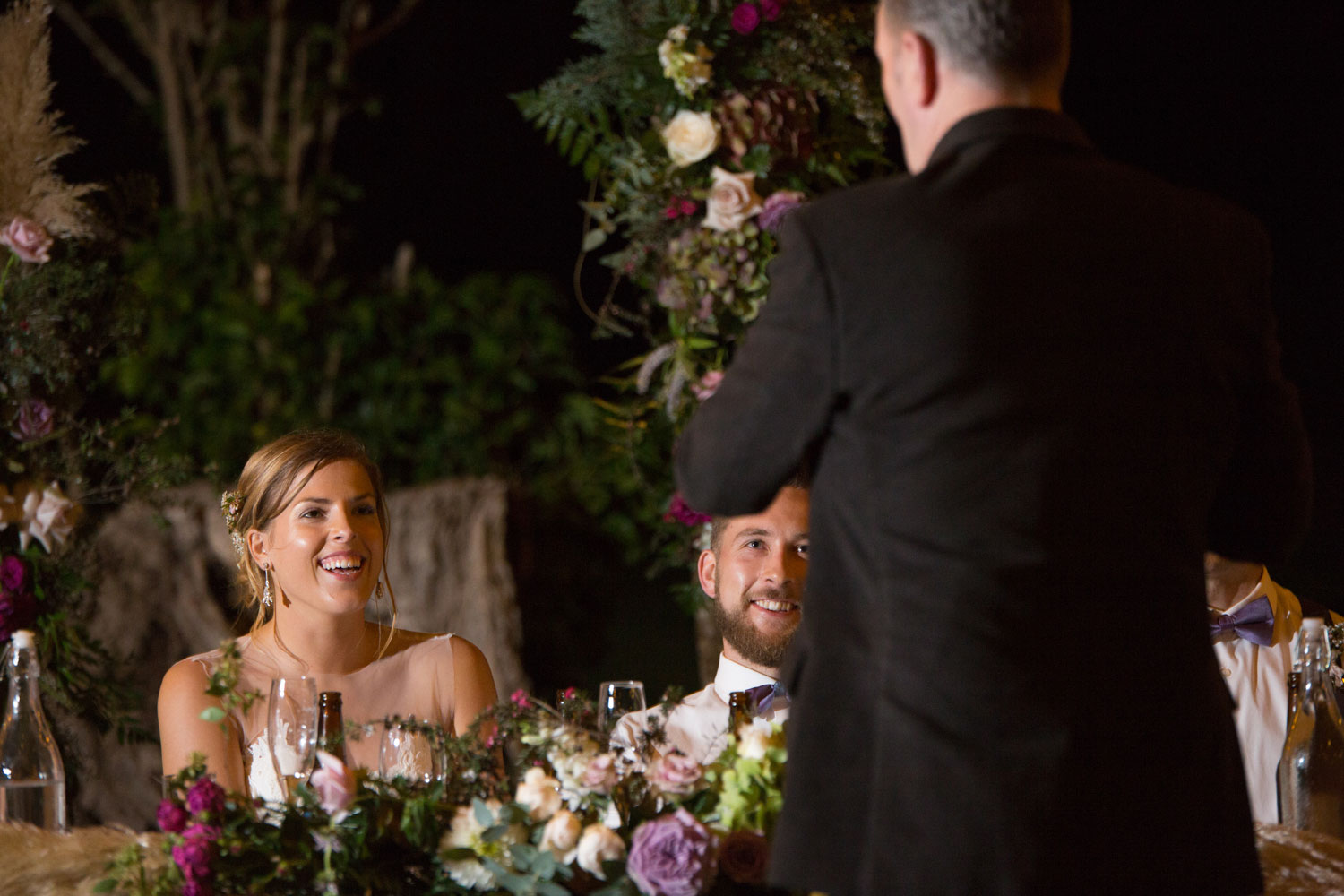 auckland wedding couple listening to speech