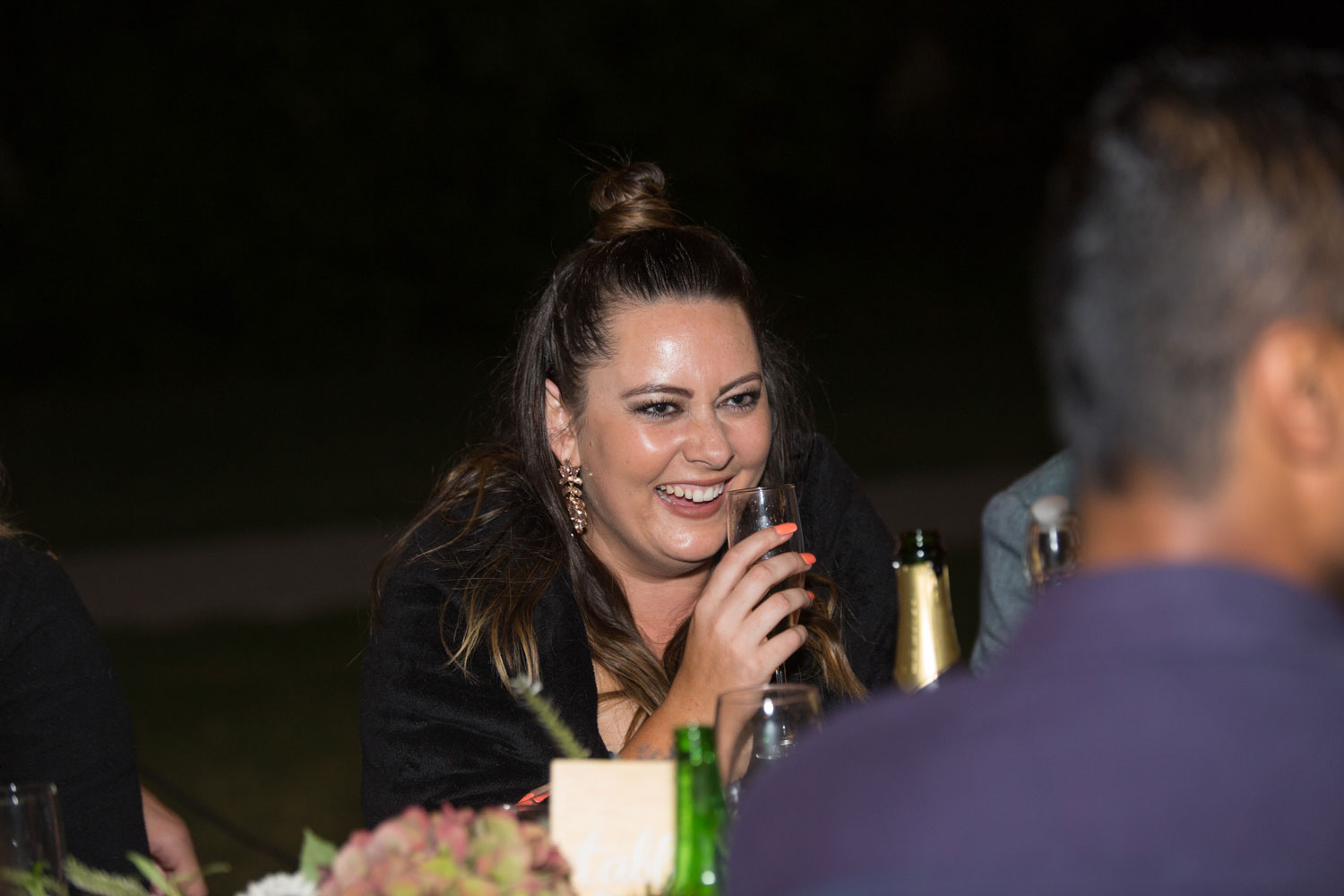 auckland wedding guest laughing hard