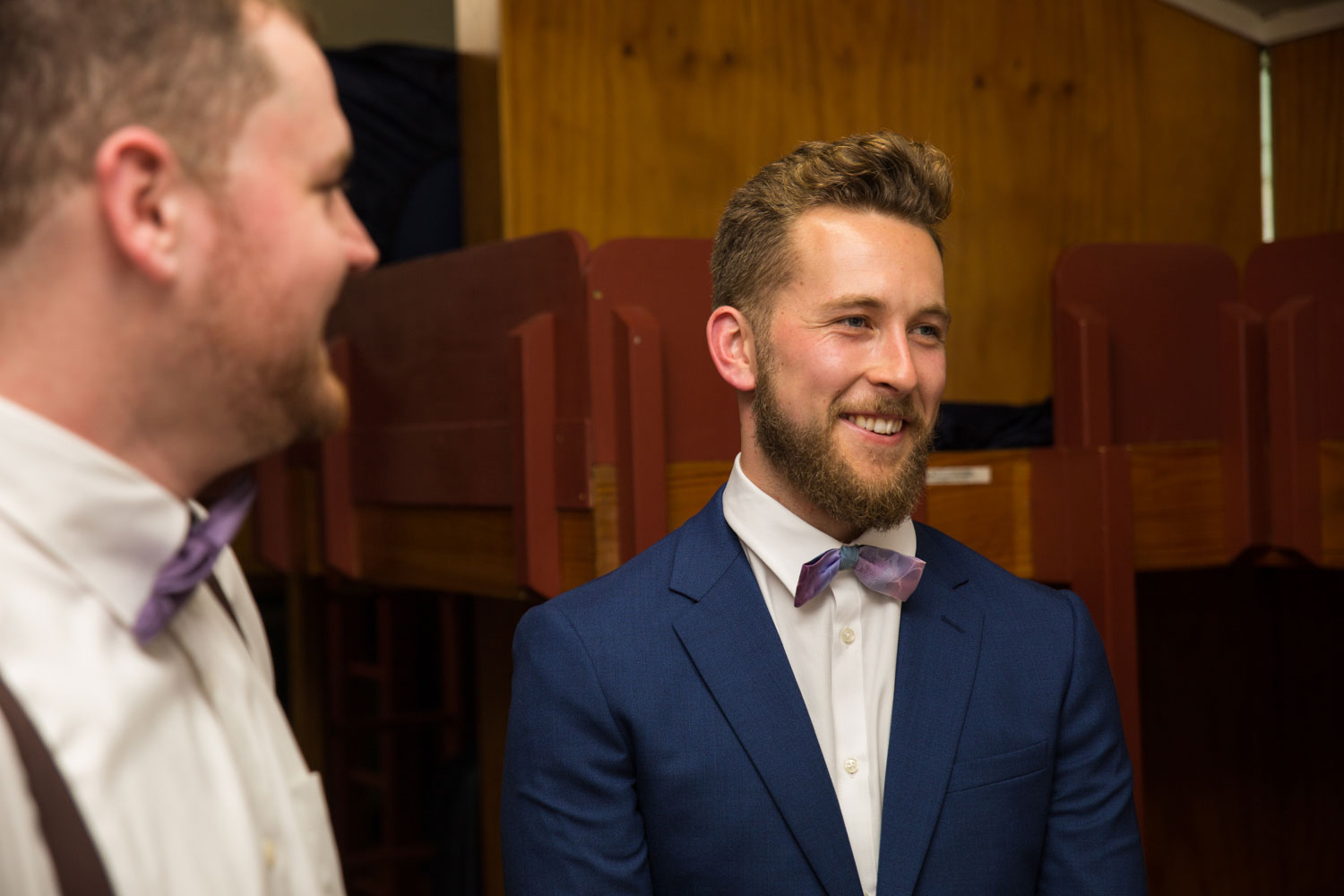 auckland wedding groom laughing