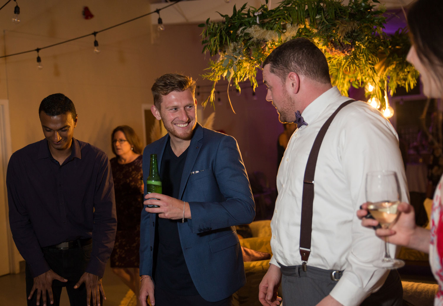 auckland wedding guests laughing