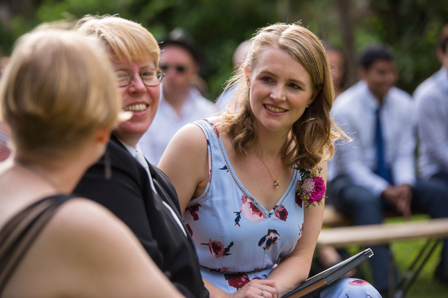 auckland wedding female guests talking