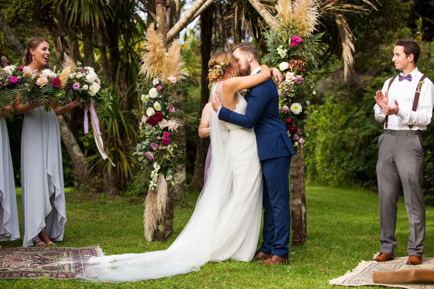 auckland wedding couple embrace during ceremony