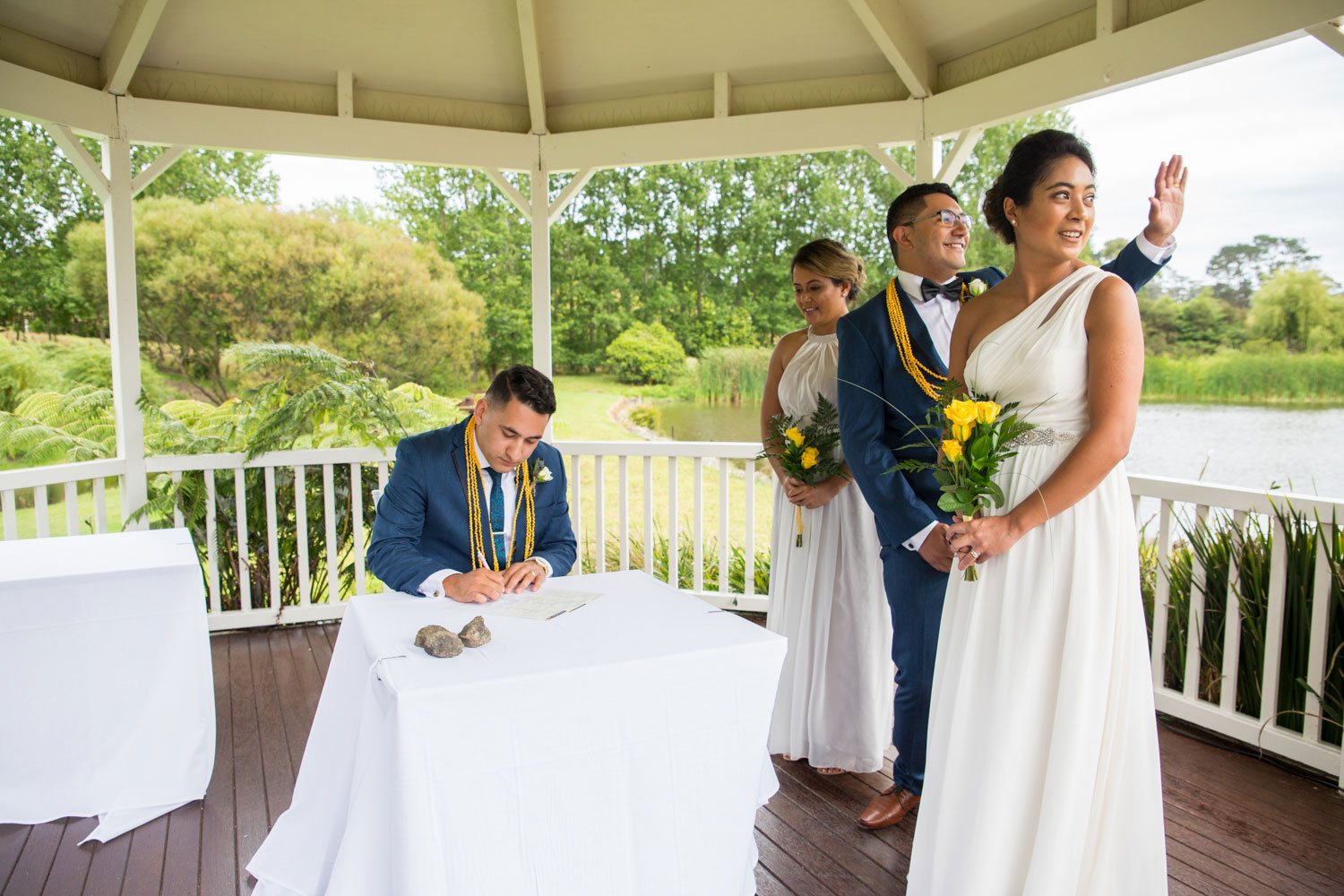 gracehill auckland wedding groom signing papers