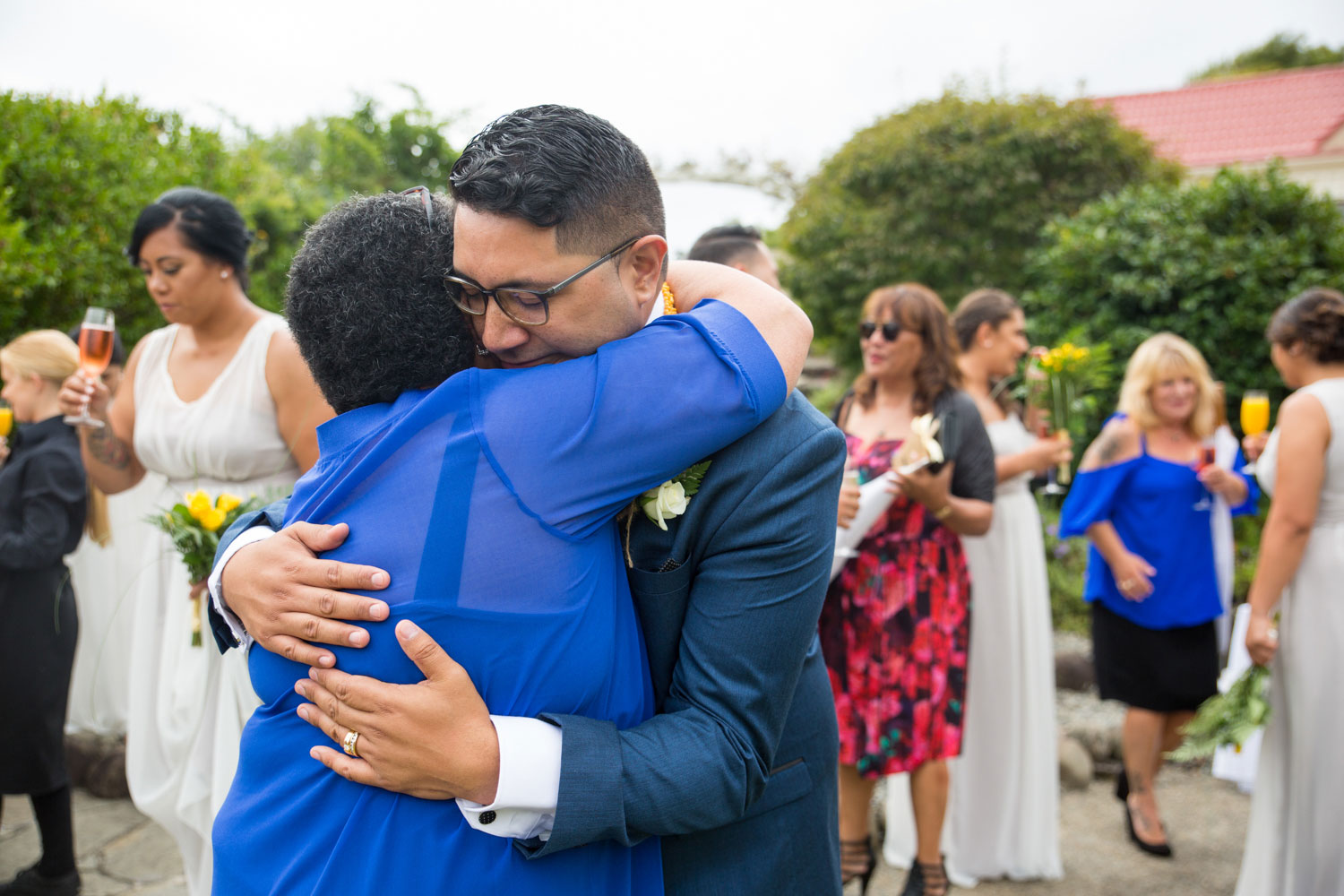 gracehill auckland wedding groom hugging a guest