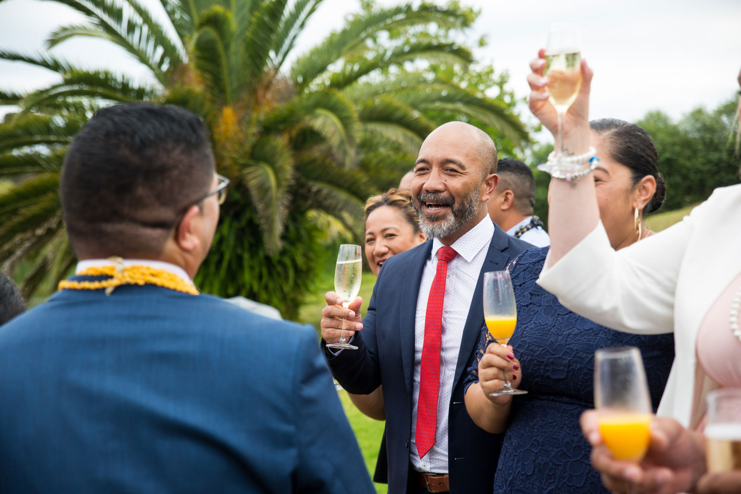 gracehill auckland wedding guest chatting with the groom