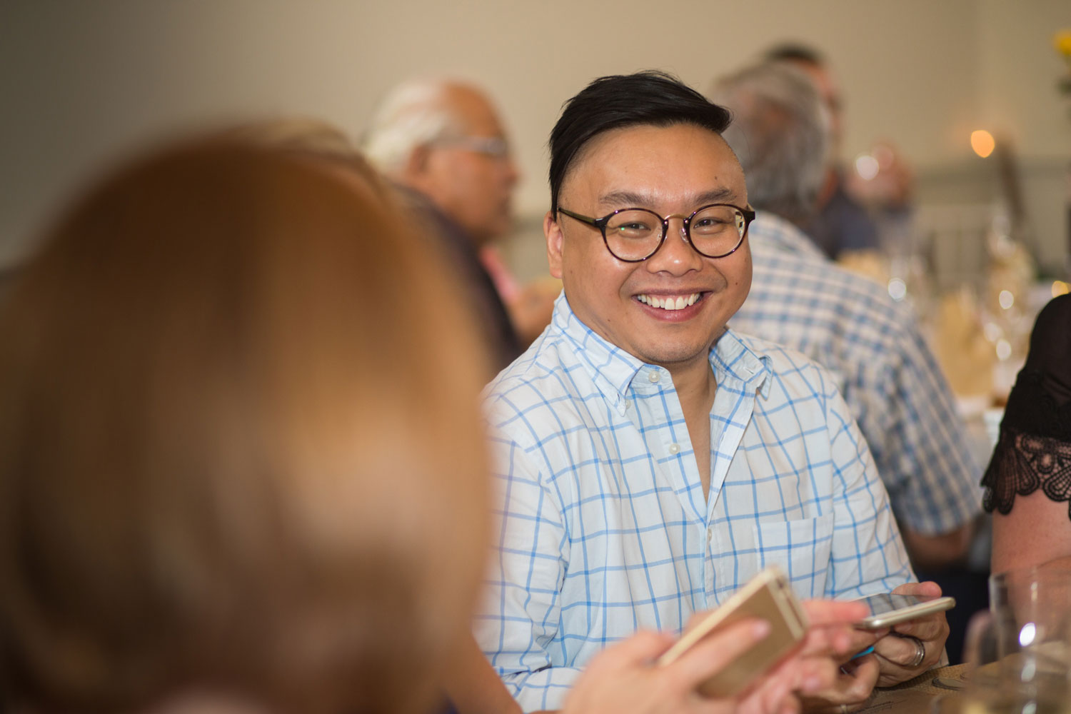 gracehill auckland wedding guest smiling at reception