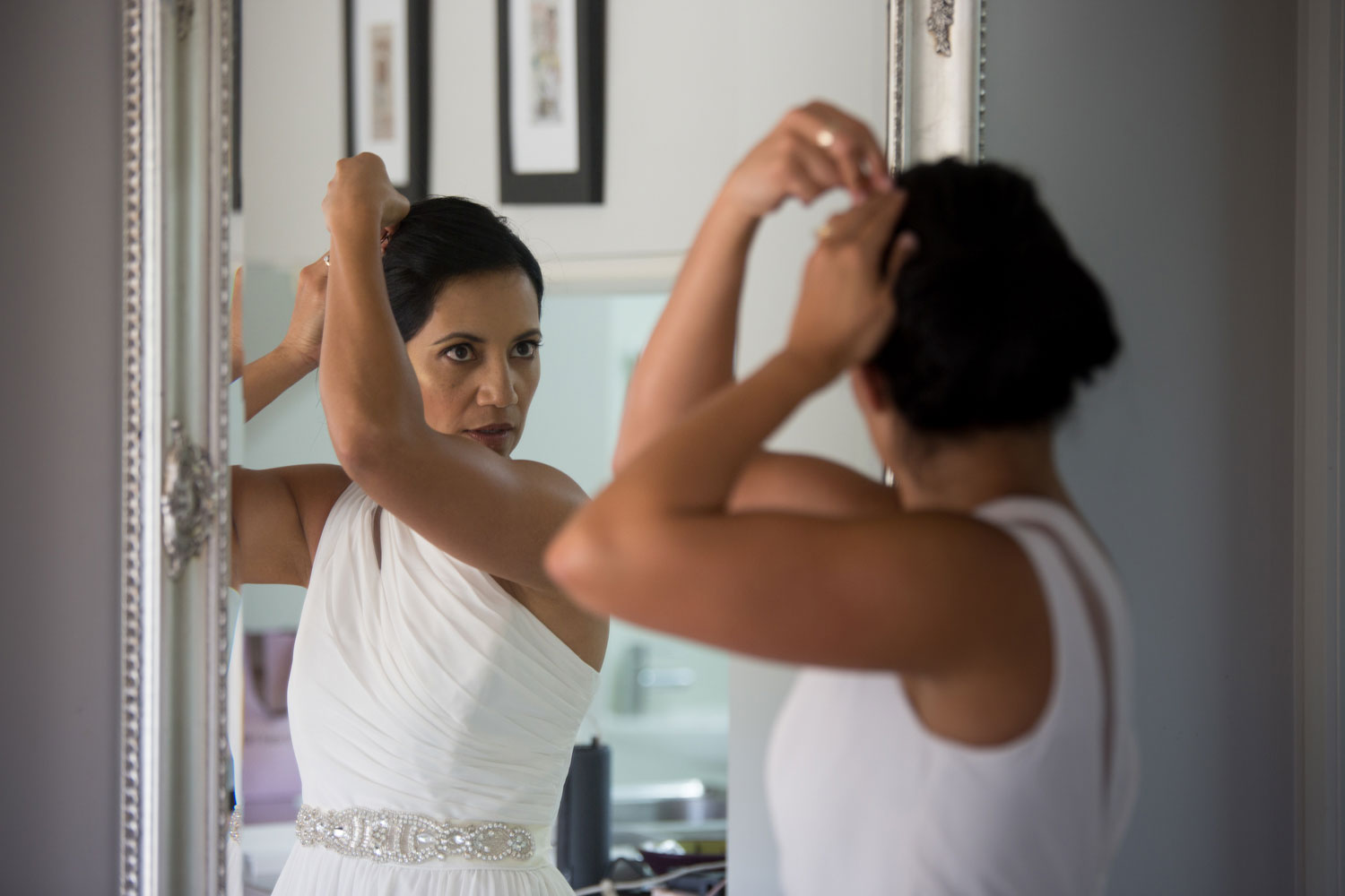 auckland wedding bridesmaid looking at the mirror