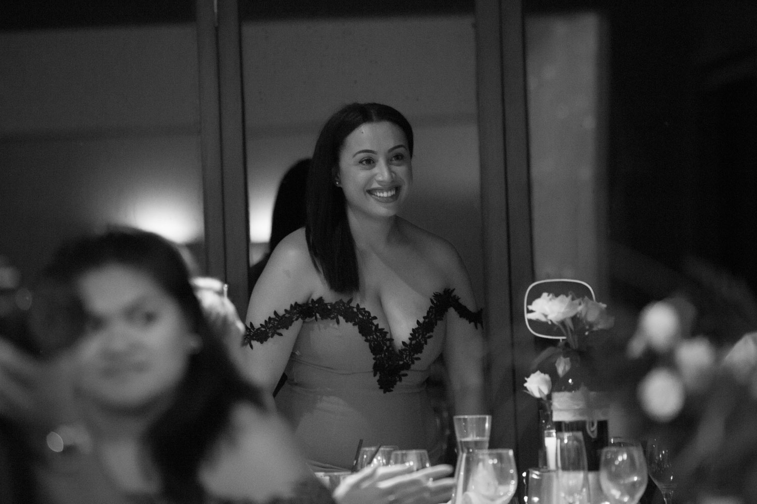 gracehill auckland wedding guest smiling in black and white